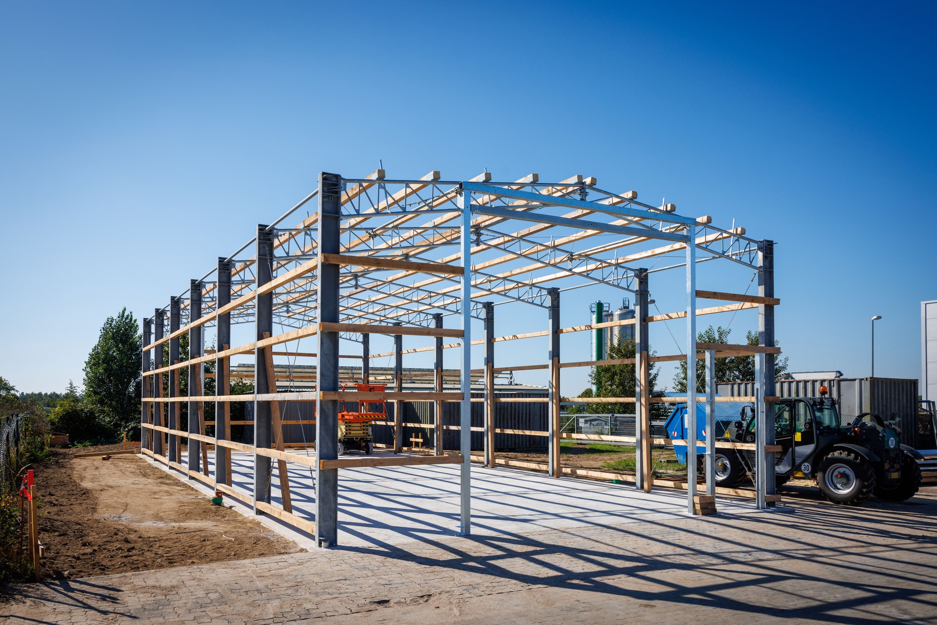 a factory hall is erected on a construction site